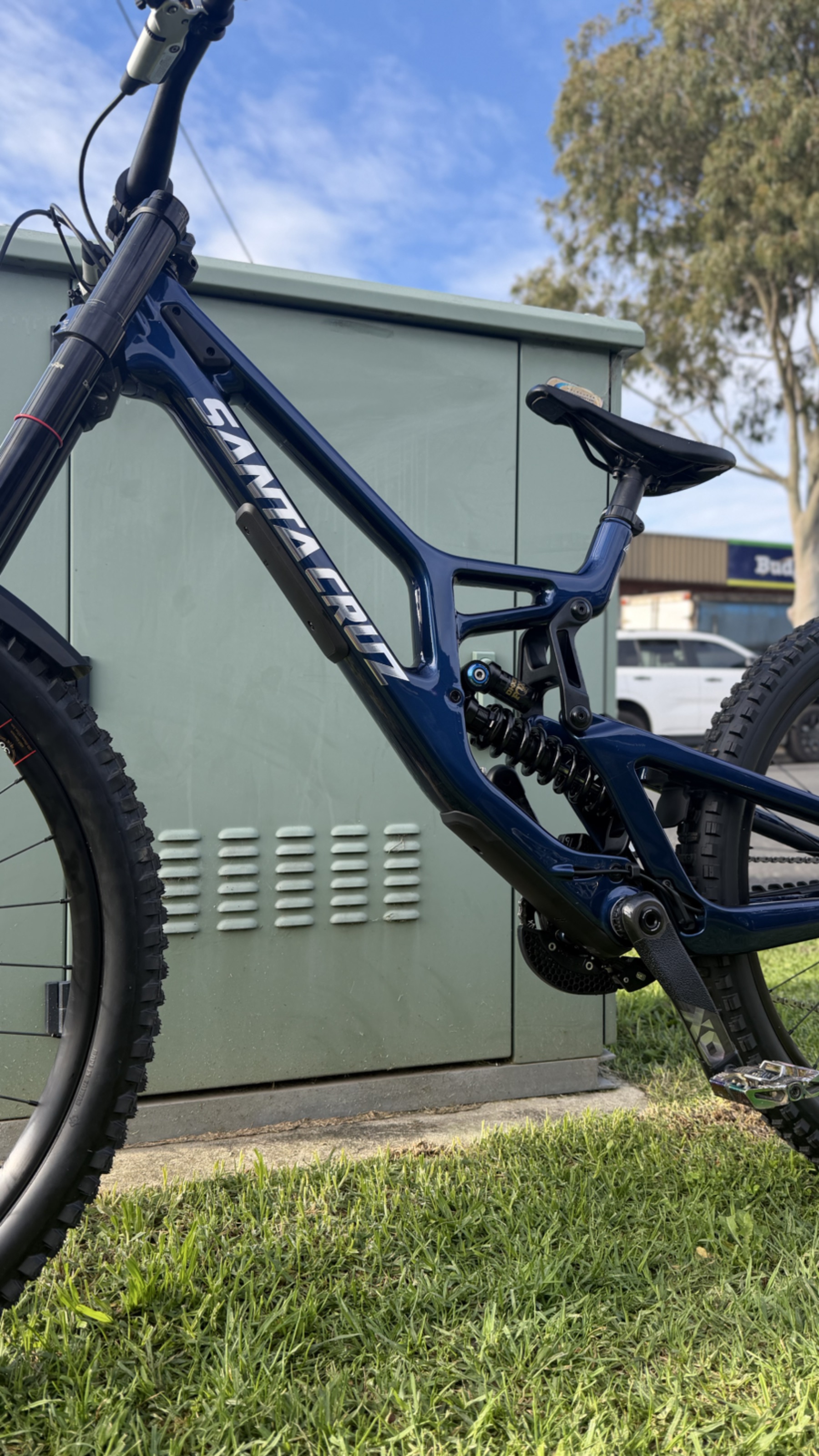 Protected blue mountain bike frame fitted by Wolfe Wraps